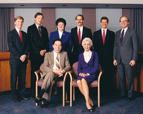 (L to R) Sitting - Vice Chairman John Warren McGarry and Chairwoman Joan D. Aikens. Standing - Senate Ex Officio Scott Morgan, Commissioners Danny L. McDonald, Lee Ann Elliott, Scott E. Thomas, Thomas J. Josefiak and House Ex-Officio Douglas Patton