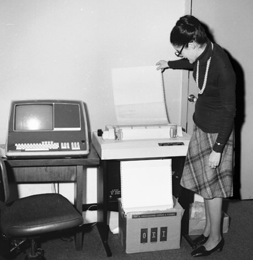 FEC staff printing financial activity report, 1982